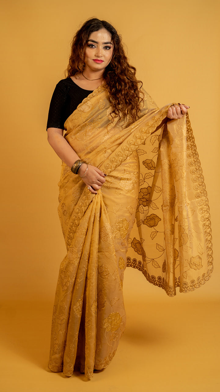 Mustard gold organza saree with floral embroidery and designer border for festive wear