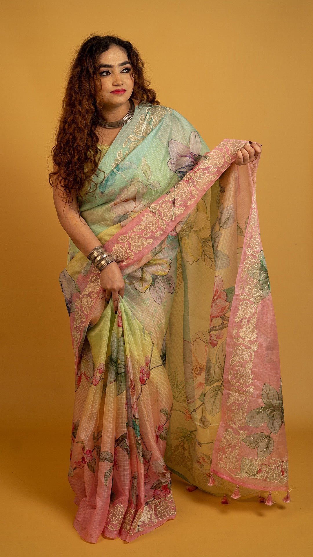 Pastel multicolor floral printed organza saree with lace border for festive and party wear