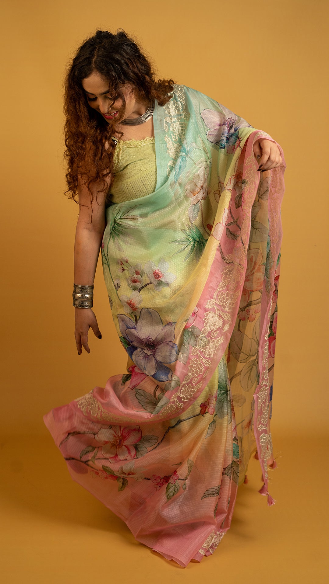 Pastel multicolor floral printed organza saree with lace border for festive and party wear