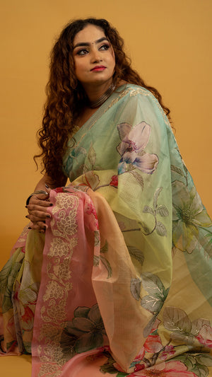 Pastel multicolor floral printed organza saree with lace border for festive and party wear