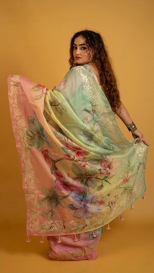 Pastel multicolor floral printed organza saree with lace border for festive and party wear