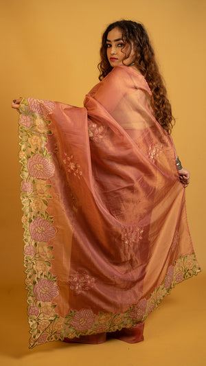 Peach organza silk saree with heavy floral embroidered border and elegant design