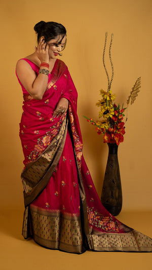 Royal red embroidered saree with antique gold zari border and floral design, perfect for wedding and festive wear