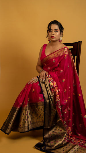 Royal red embroidered saree with antique gold zari border and floral design, perfect for wedding and festive wear