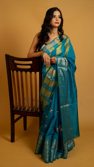 Teal blue silk saree with gold zari border and traditional woven design